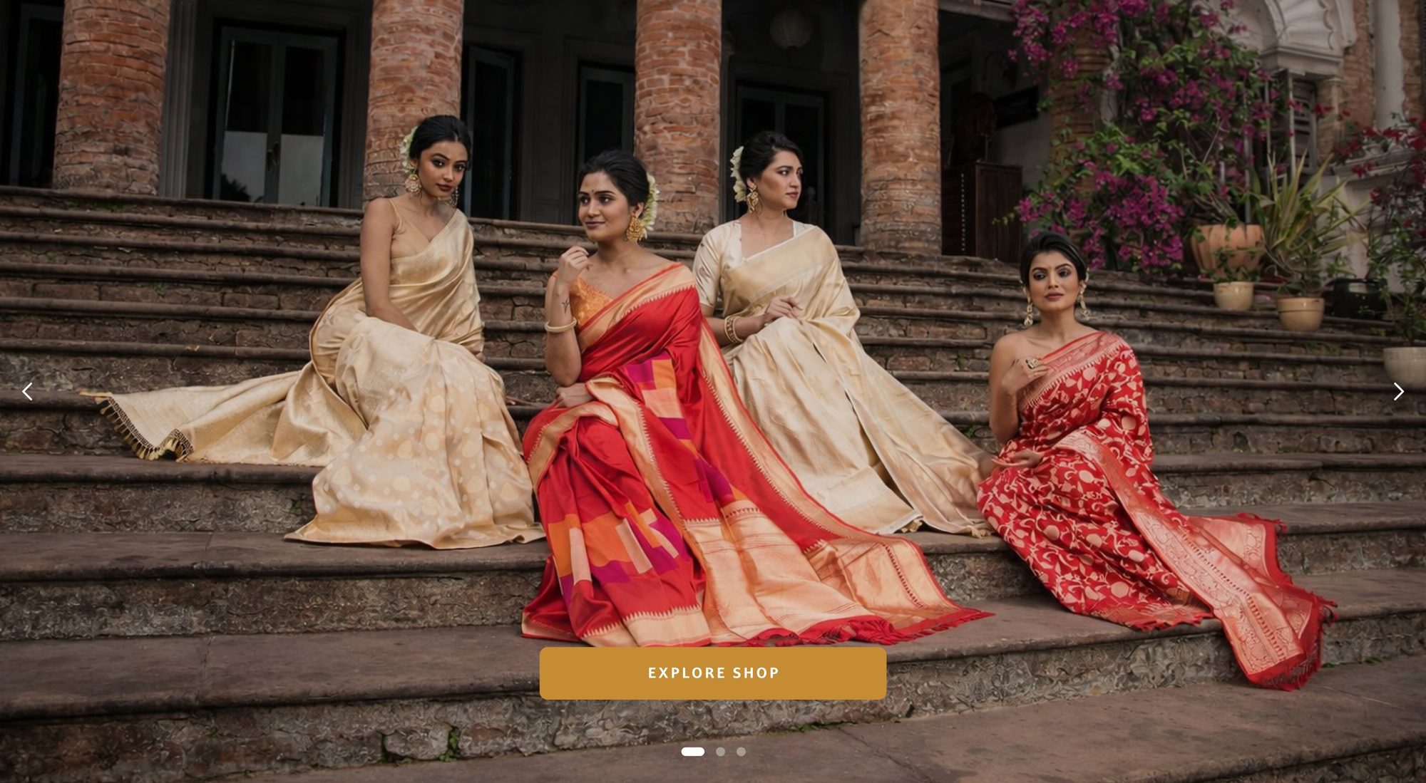Hero slide: four women in Banarasi silk sarees on old stone steps